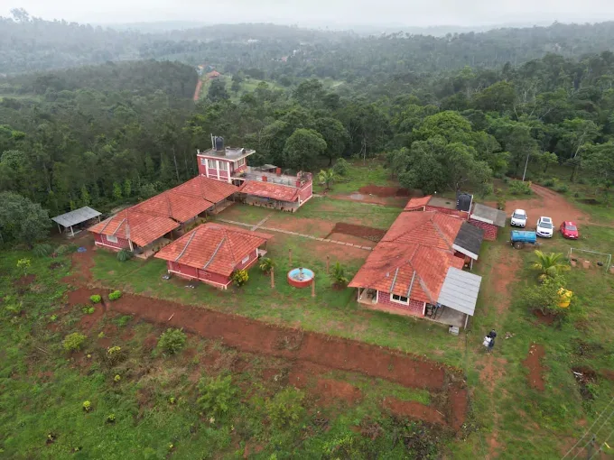 5 Acres Hilltop Homestay Property for Sale in Sakleshpur | 9 Cottages, Spectacular Views, Near State Highway